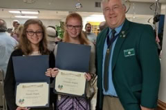 President Shawn Lenahan presented the 2018 General Meagher Division scholastic award at the St Patrick Elementary School commencement. The awardees are twin sisters Natalie and Cassandra Wujick.  Both girls will attend St Michael the Archangel in the fall