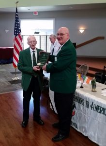 Brother Michael Creegan receives the award from State President Eugene Bransfield, Sr.